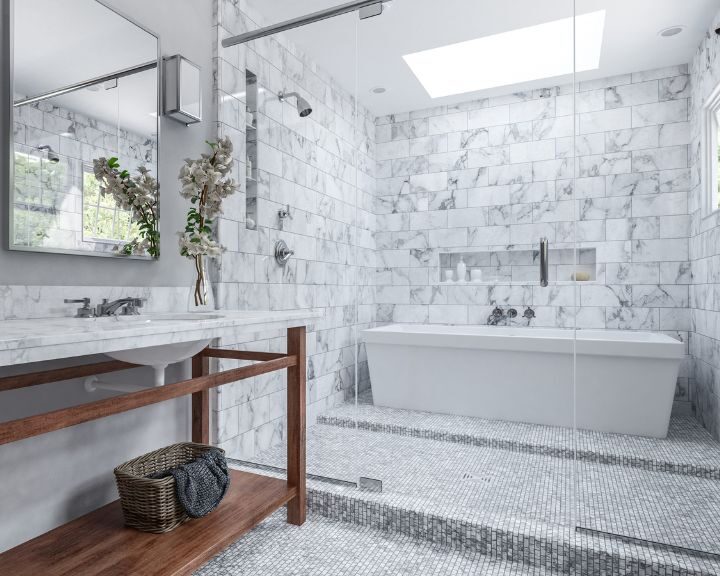 A white bathroom with marble floors in Southampton.